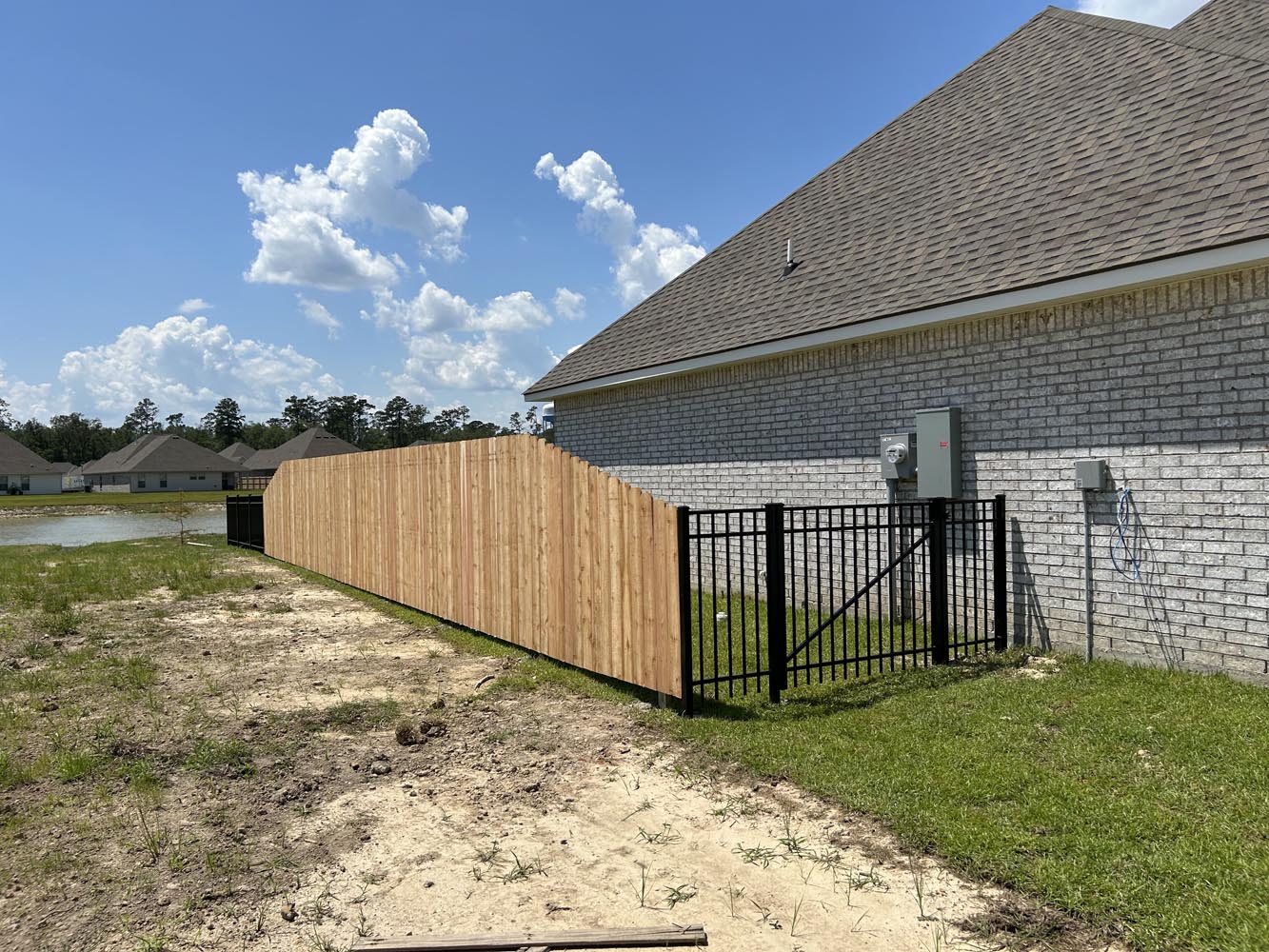 Wood Privacy Fence with Transition to Aluminum